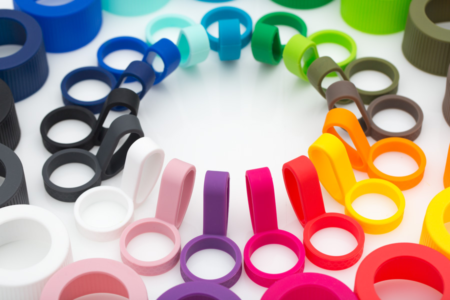 colorful addons for myNizza colorful silicone addons for drinking bottle myNizza arranged in a circle