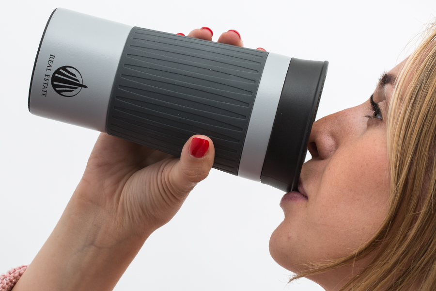 360° drinking opening Woman drinking from thermo mug myKingston
