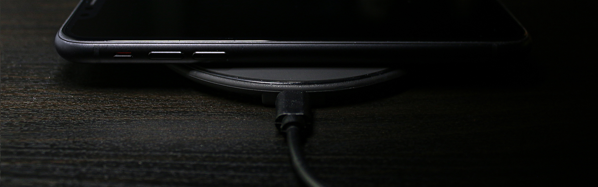 Mobile phone on wireless charger mobile phone on wireless charging station