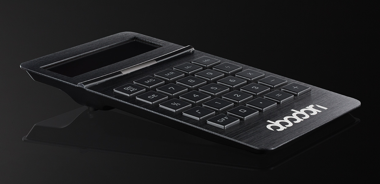 Solar pocket calculator REEVES-JOINVILLE with pad printing Calculator promotional item in black with black background