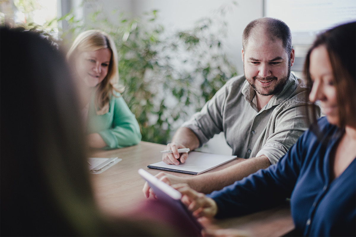 REFLECTS employees work on digital solutions