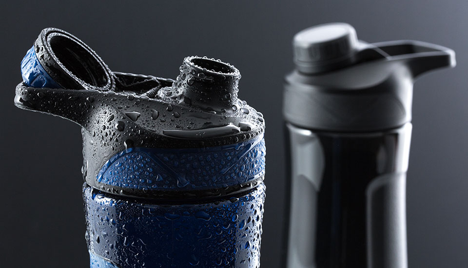 Retumbler drinkflessen als promotieartikel Promotionele drinkflessen in donkerblauw en zwart