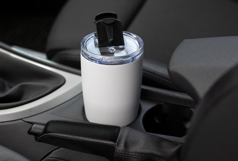 Vacuum thermo mug RETUMBLER-COLESSO as a promotional item Vacuum thermo mug RETUMBLER-COLESSO in the car
