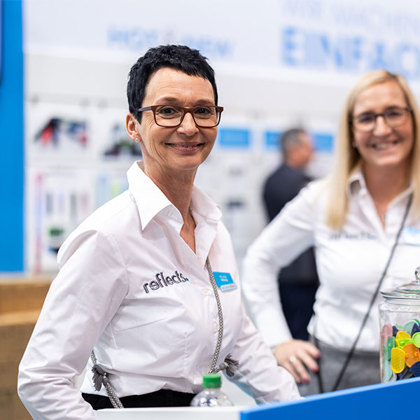 Reflects at national trade fairs Reflects employee Melanie Breuer at PSI trade fair stand 2025