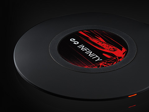 Wireless Charger REEVES-OCEANSIDE black 15 Watt with logo print Round Wireless Charger in black with black and red UV print